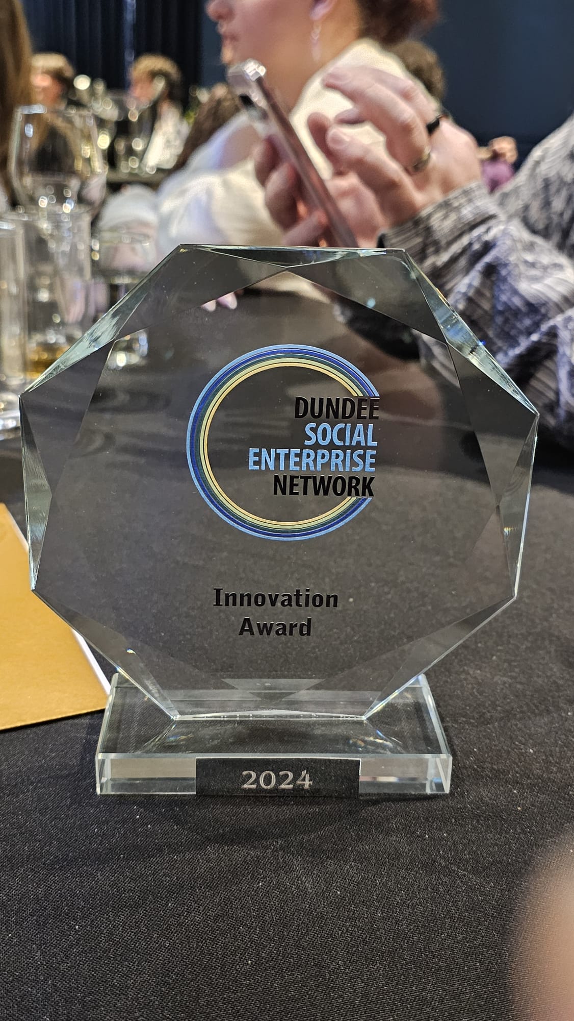 Dundee social enterprise award, on a table