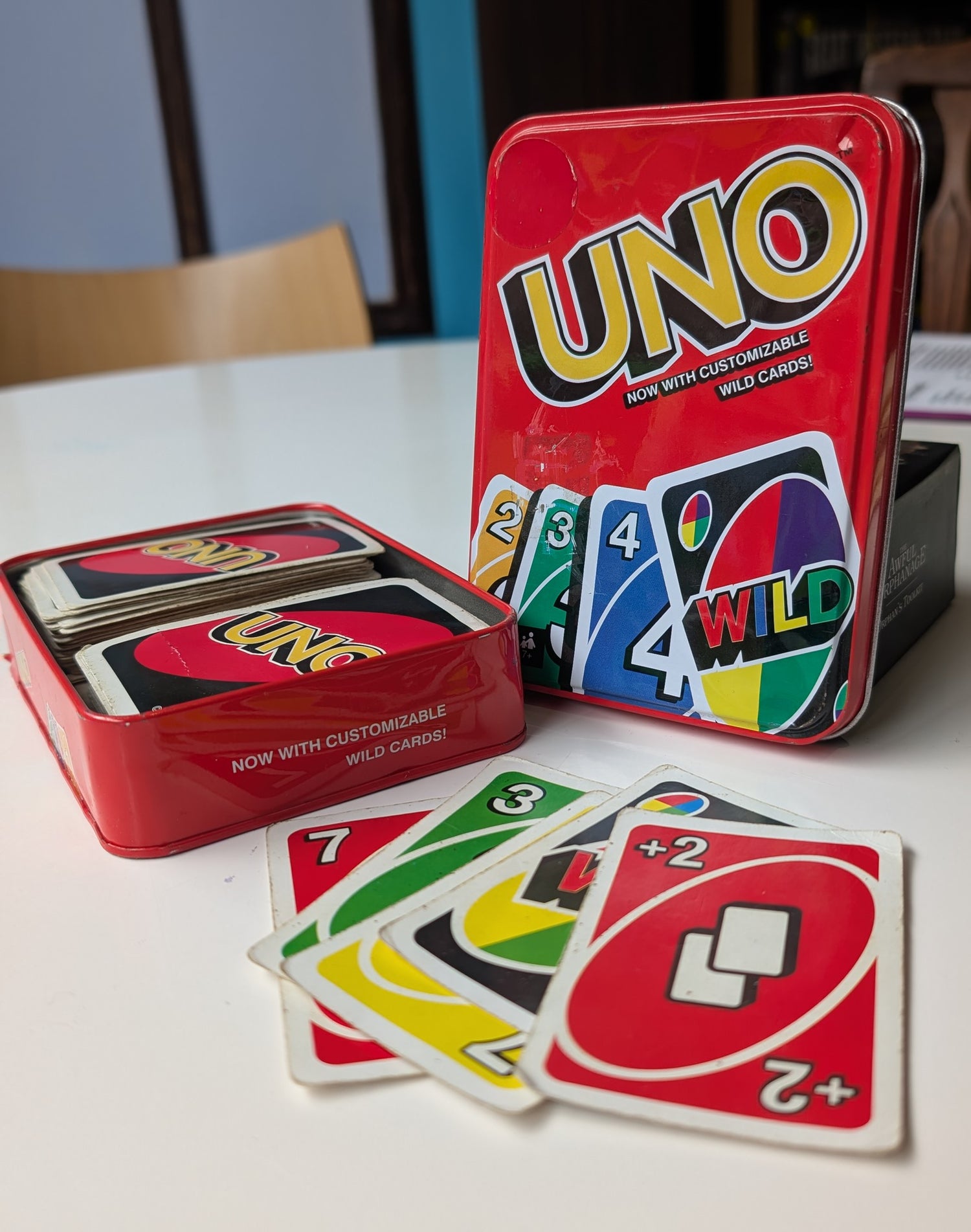 Uno playing cards laid out on a white table