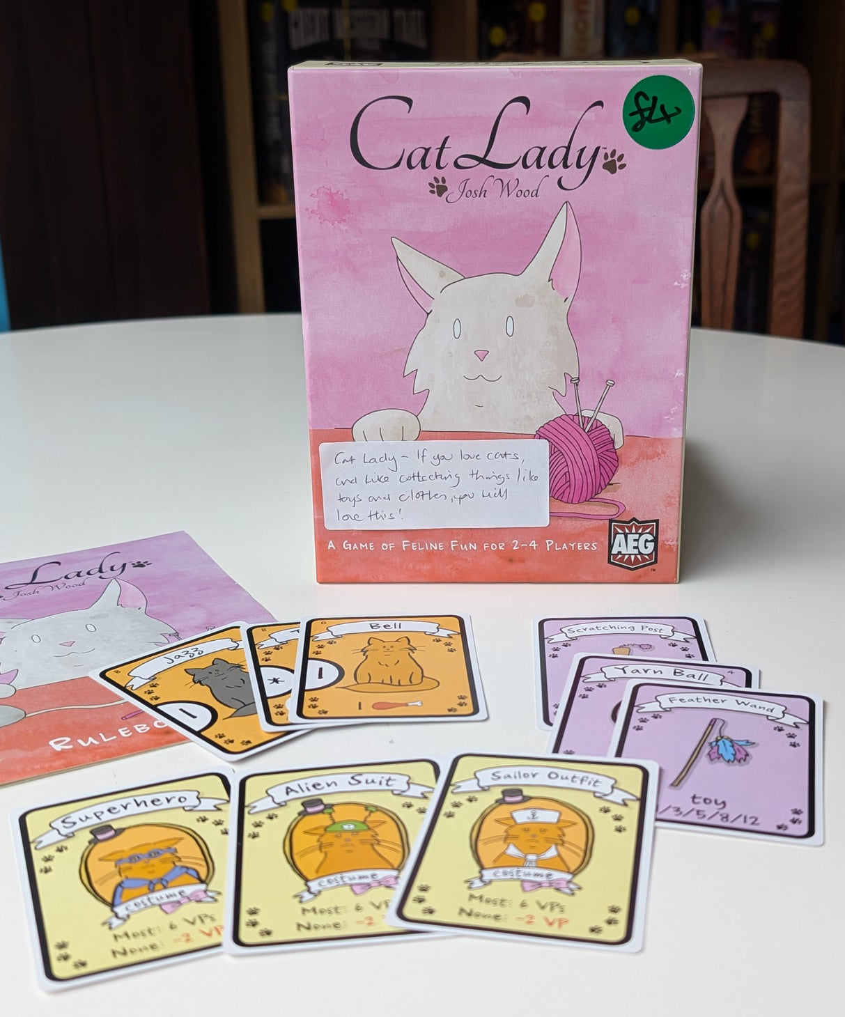 Card game called 'Cat Lady' with playing cards on a table