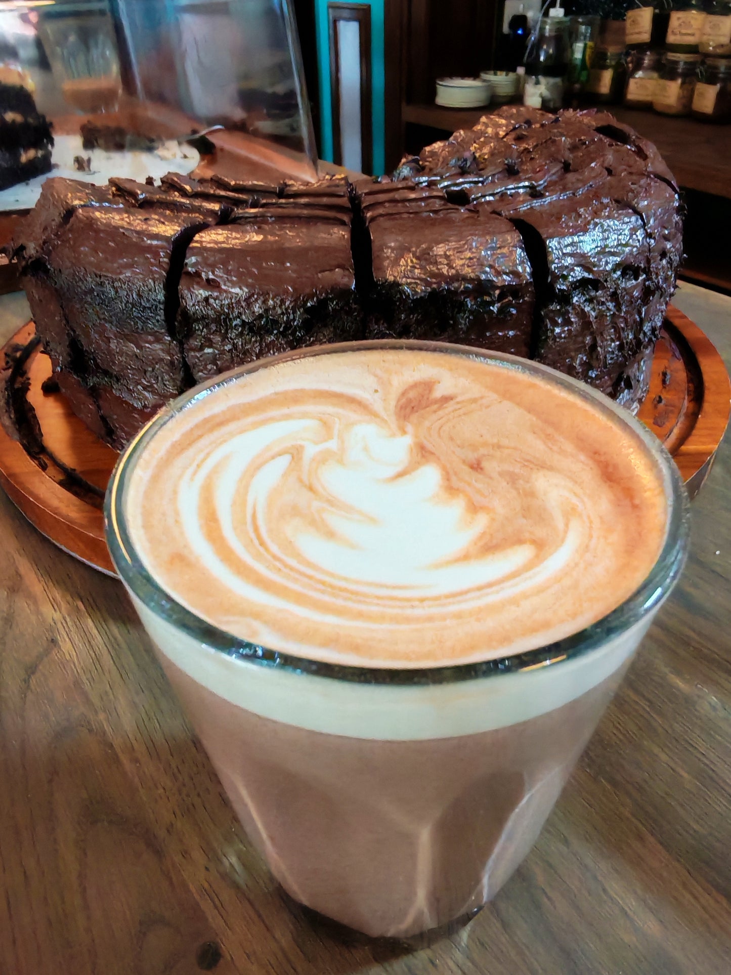 Chocolate cake and a latte coffee