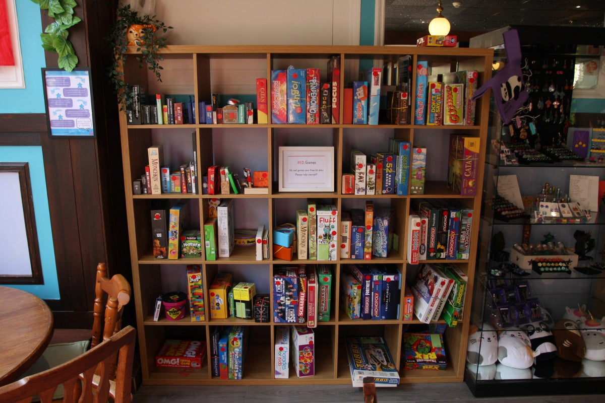 Shelves full of board games in the café